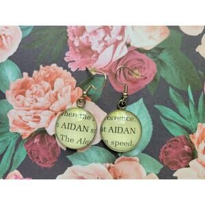 AIDAN pendant earrings made with The Illuminae Files book pages